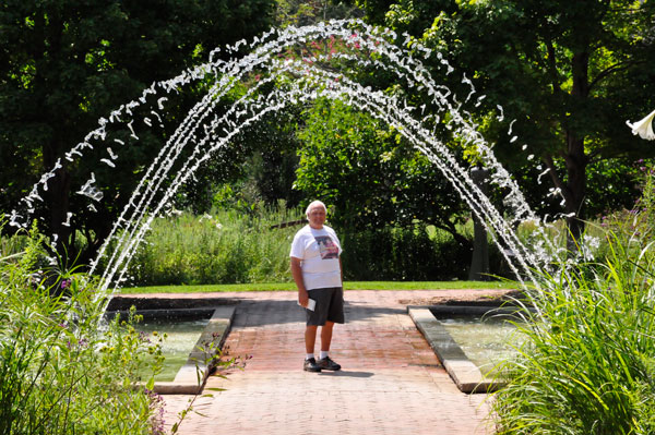 Lee Duquette getting wet at the water fountain